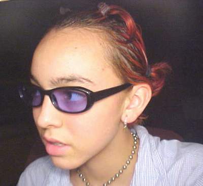 thats me on 07/31/01. see my hairs red. its real faded now though. im a dork.