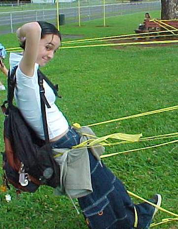 Caution tape is so cool. Me, Steph, and Kendra were playing with it on the playground. It was holding me up. I look so pimpin.